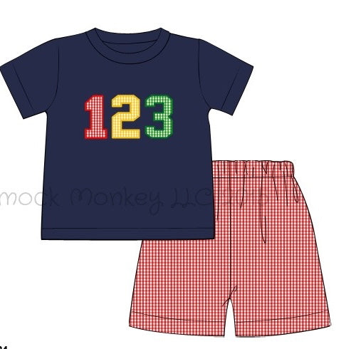 Boy's applique "123" navy short sleeve knit shirt and red microgingham short set (7t)