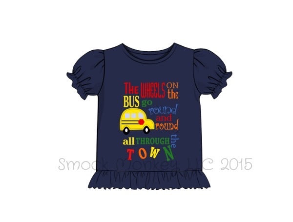 Girl’s applique "WHEELS ON THE BUS" navy blue knit short sleeve ruffle shirt (24m,8t)